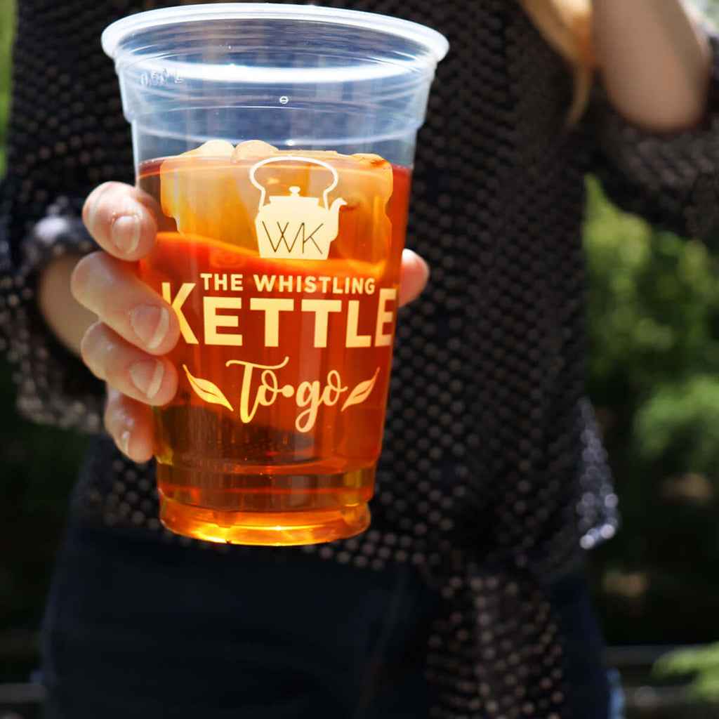 Holding iced tea with ice