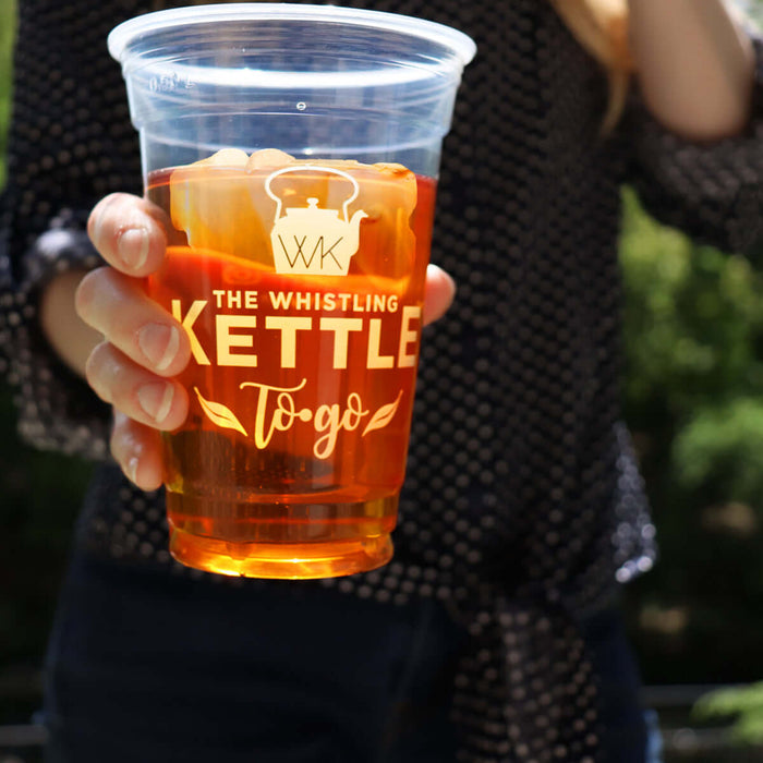 Holding iced tea with ice