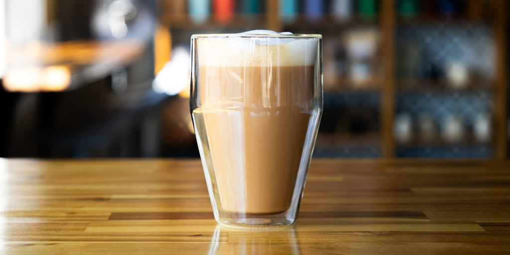 Hot Dirty Chai Latte in clear glass