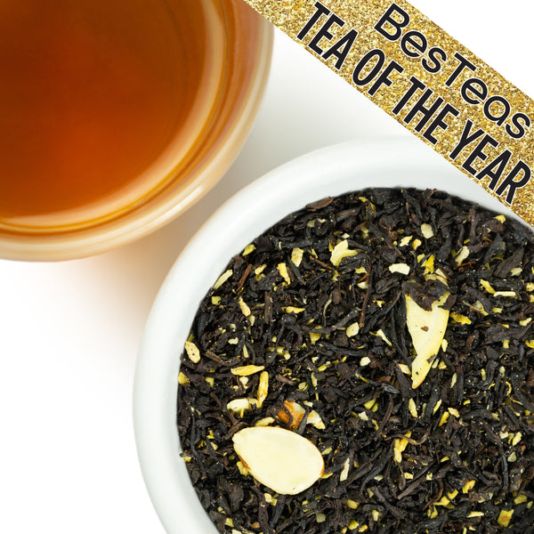 loose leaf snowflake tea next to a brewed cup with besteas logo "tea of the year"