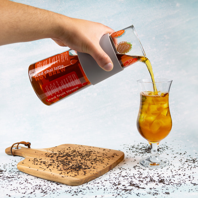 The Whistling Kettle Conflicted Iced Tea Brewer pouring into glass