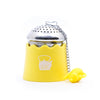 The Whistling Kettle "The Egg" Stainless Steel Tea Ball Infuser with Drip Tray in yellow.