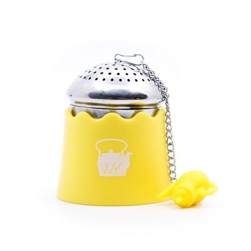 The Whistling Kettle "The Egg" Stainless Steel Tea Ball Infuser with Drip Tray in yellow.