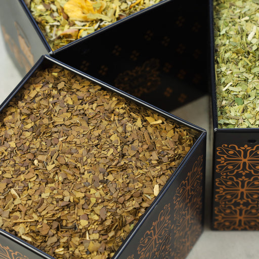 Tea Tin filled with Roasted Yerba Mate tea leaves.