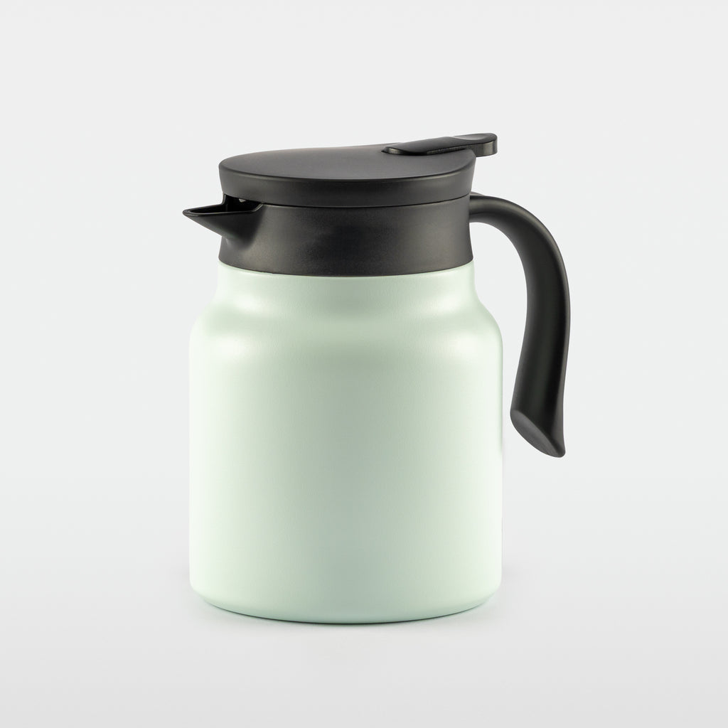 The Steep & Keep insulated tea carafe with black lid and handle
