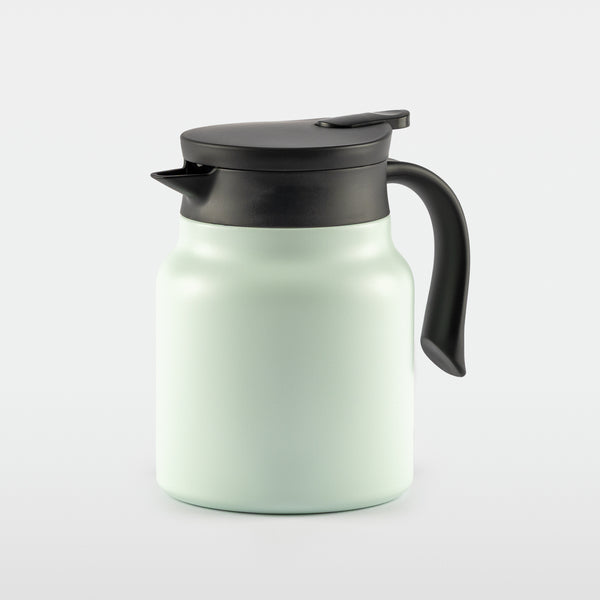 The Steep & Keep insulated tea carafe with black lid and handle