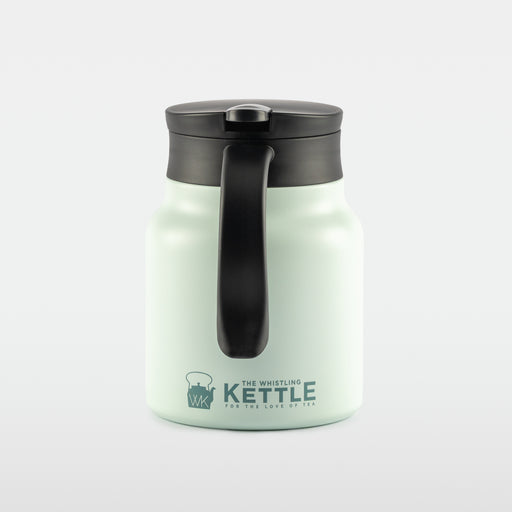 A mint green insulated kettle with a black lid and handle, feature “The Whistling Kettle” logo on the front