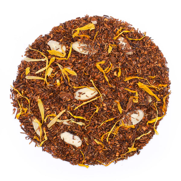 Top mound picture of The Whistling Kettle Vanilla Rooibos tea with almond slices and calendula petals.