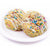 The Whistling Kettle Birthday Cake scones on a plate.