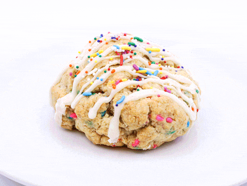 Animation of The Whistling Kettle Birthday Cake scone being eaten.