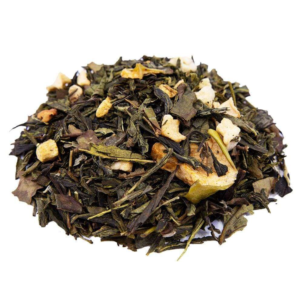 Side mound picture of The Whistling Kettle Apple Ginger green tea with dried apple and ginger bits.