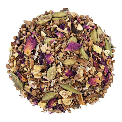 Top mound shot of The Whistling Kettle Balancing tea with cinnamon pieces, cardamom, licorice roots, coriander, fennel, ginger roots, rose leaves, and licorice root.