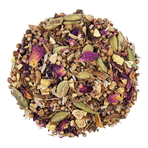 Top mound shot of The Whistling Kettle Balancing tea with cinnamon pieces, cardamom, licorice roots, coriander, fennel, ginger roots, rose leaves, and licorice root.