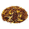 Side mound picture of The Whistling Kettle Belgian Chocolate rooibos tea with calendula petals and chocolate bits.