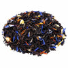 Side mound picture of The Whistling Kettle Blend 1776 black tea with cornflower, safflower, and jasmine petals.