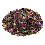 Side mound picture of The Whistling Kettle Cherry Rose green tea with rose petals.