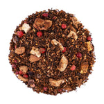 Top mound picture of The Whistling Kettle Chocolate Monkey rooibos tea with dried banana, cacao, and pink peppercorn.