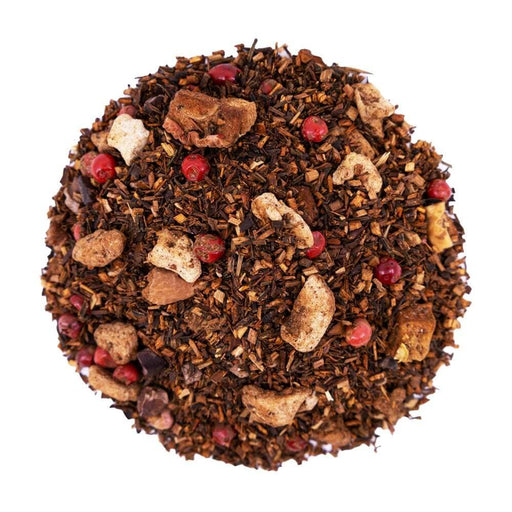 Top mound picture of The Whistling Kettle Chocolate Monkey rooibos tea with dried banana, cacao, and pink peppercorn.