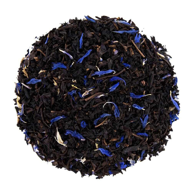Top mound picture of The Whistling Kettle Decaf Earl Grey black tea with blue cornflowers.