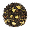 Top mound picture of The Whistling Kettle Green Tea Chai with a mix of fine green tea, spices, and sliced almonds.