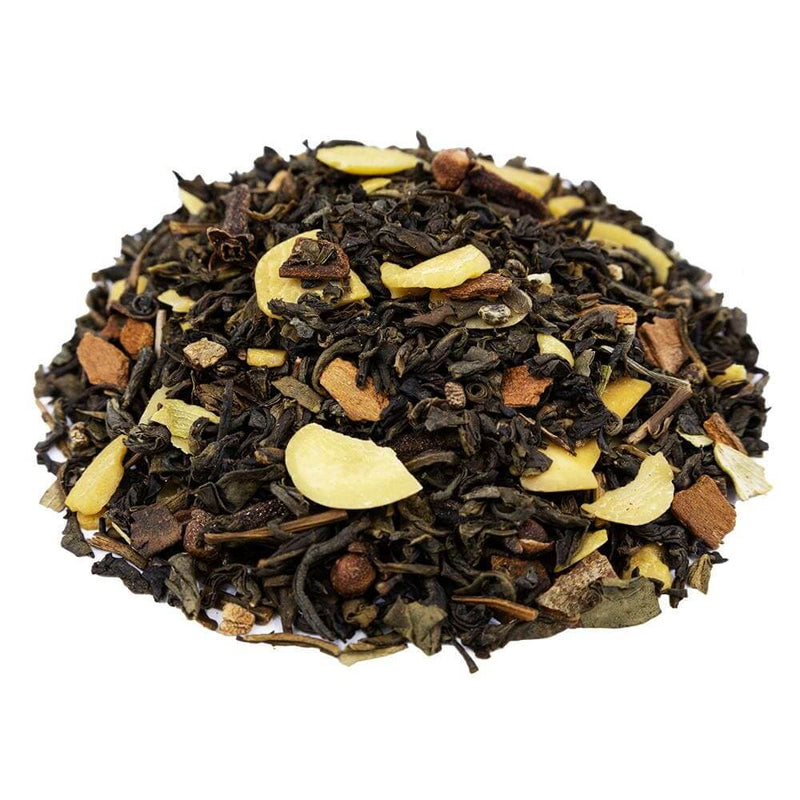 Side mound picture of The Whistling Kettle Green Tea Chai with a mix of fine green tea, spices, and sliced almonds.