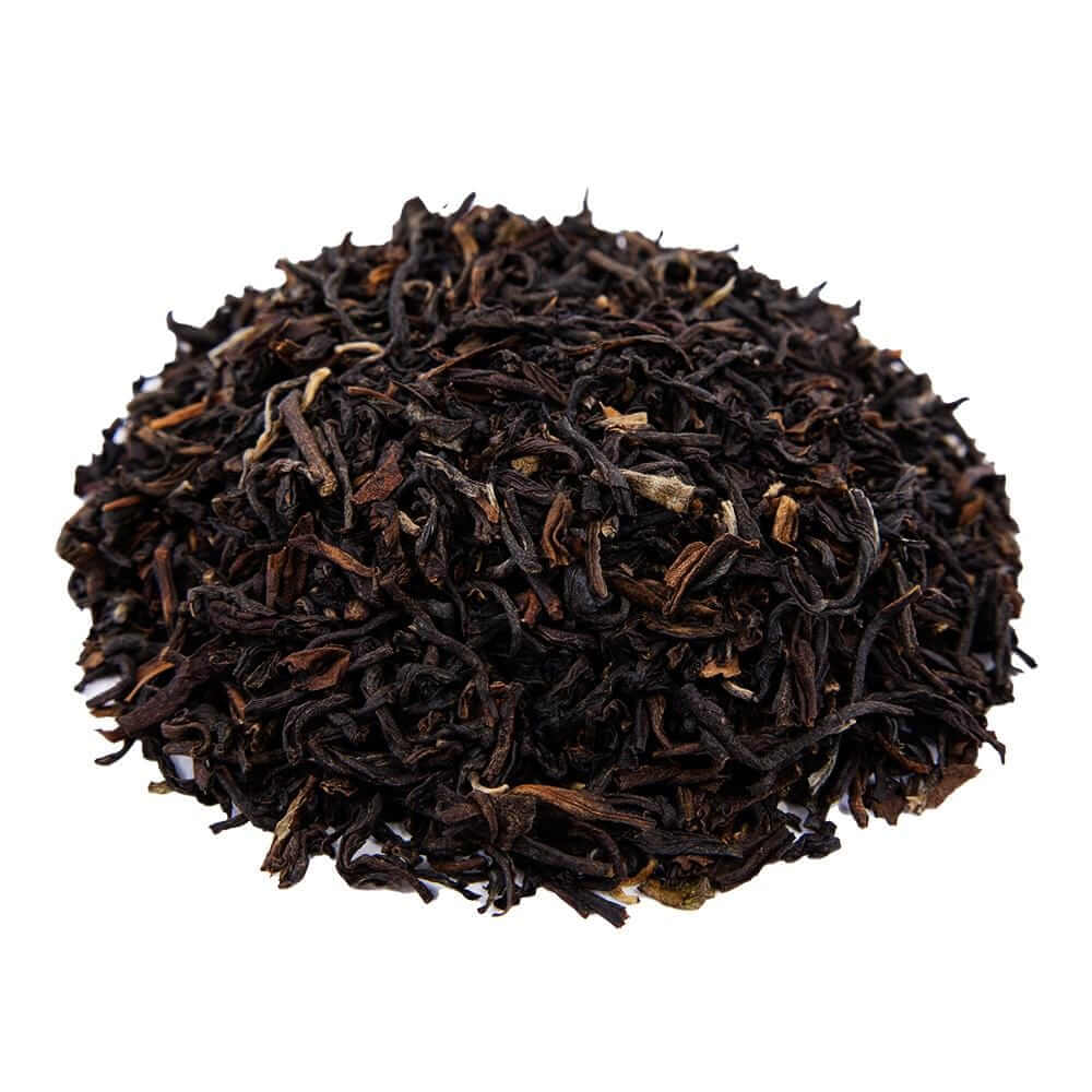 Side mound picture of The Whistling Kettle Happy Valley Darjeeling black tea leaves.