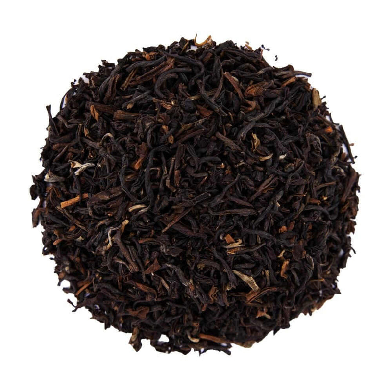 Top mound picture of The Whistling Kettle Happy Valley Darjeeling black tea leaves.