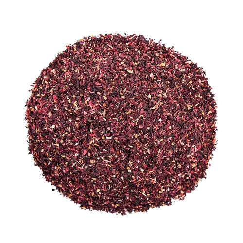 Top mound picture of The Whistling Kettle Hibiscus tea with fine cut pieces of hibiscus.