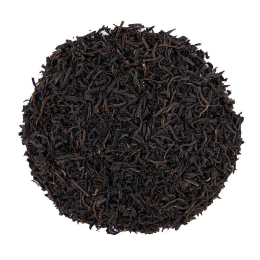 Top mound picture of The Whistling Kettle Keemun Panda black tea leaves.