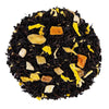 Top mound picture of The Whistling Kettle Mango Passionfruit black tea with dried fruit cubes and marigold petals.