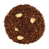 Top mound picture of The Whistling Kettle Marzipan Rooibos tea with sliced almonds.