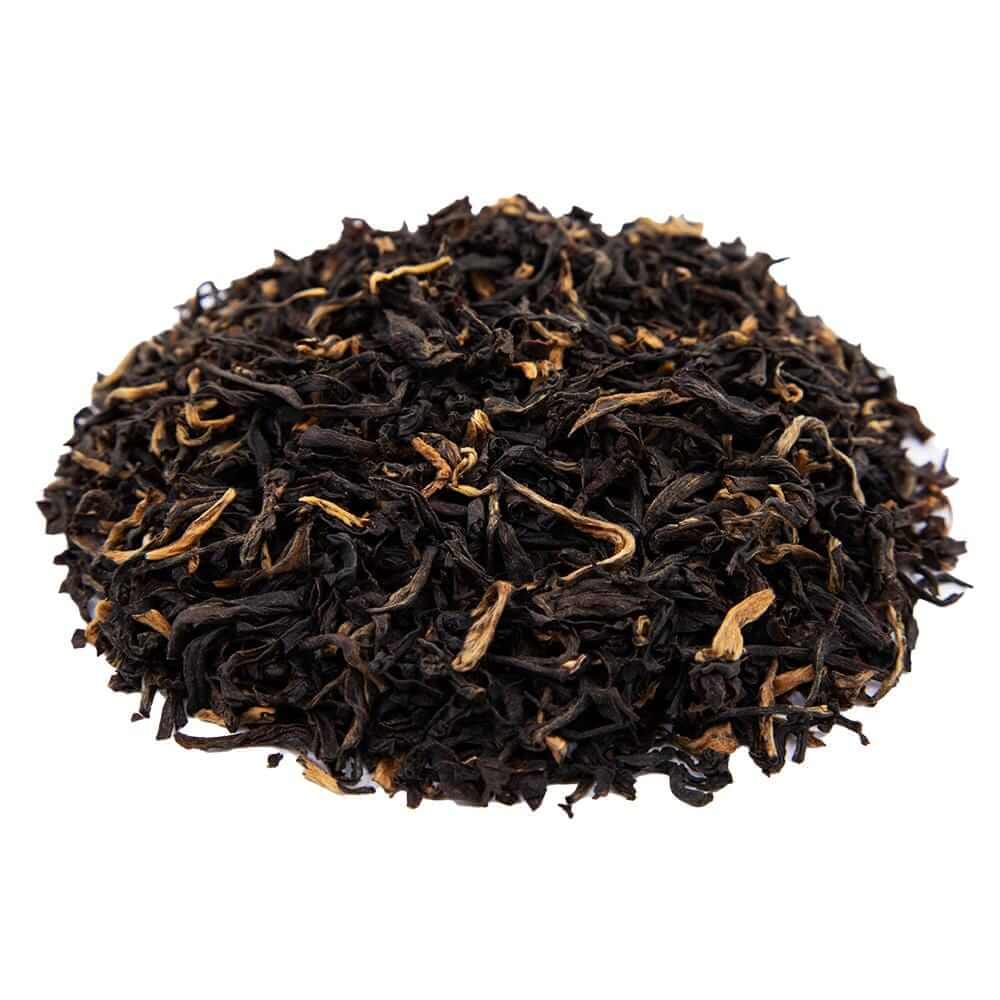 Side mound picture of The Whistling Kettle Mokalbari East Assam black tea with golden tips.