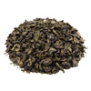 Side mound picture of The Whistling Kettle Moroccan Mint green tea with mint leaves.