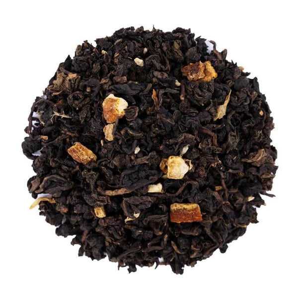 Top mound picture of The Whistling Kettle Orange Ginger Oolong tea with dried orange peel and ginger root.