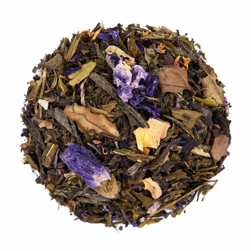 Top mound picture of The Whistling Kettle Shaolin's Grove green tea with blue cornflowers.