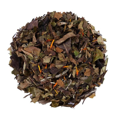 Top mound picture of The Whistling Kettle Sparkling Raspberry Wine white tea with cornflower petals.