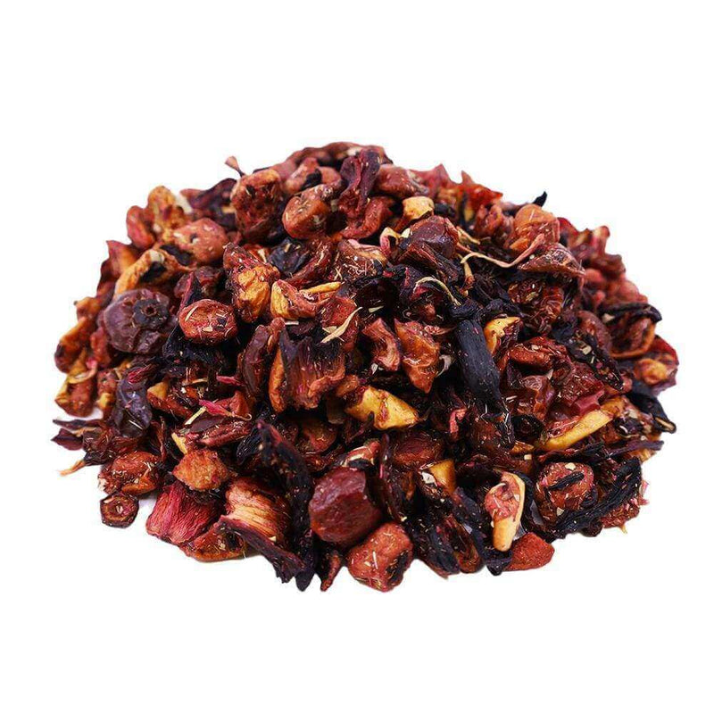 Side mound picture of The Whistling Kettle Strawberry Watermelon loose leaf tea with dried berries, apple, hibiscus, and rose hips.