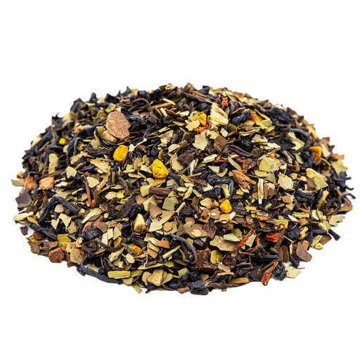 Side mound picture of The Whistling Kettle Trugrit Tea with mate, purple tea, and turmeric bits.